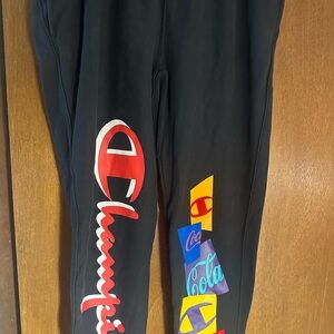 Champion women/men  Bottoms in Black with Multicolor Logos